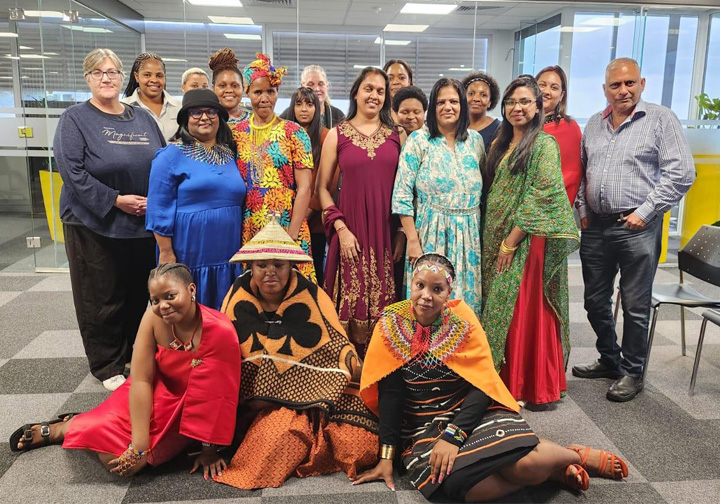 A group of Intertek South Africa colleagues pose in their traditional clothing.