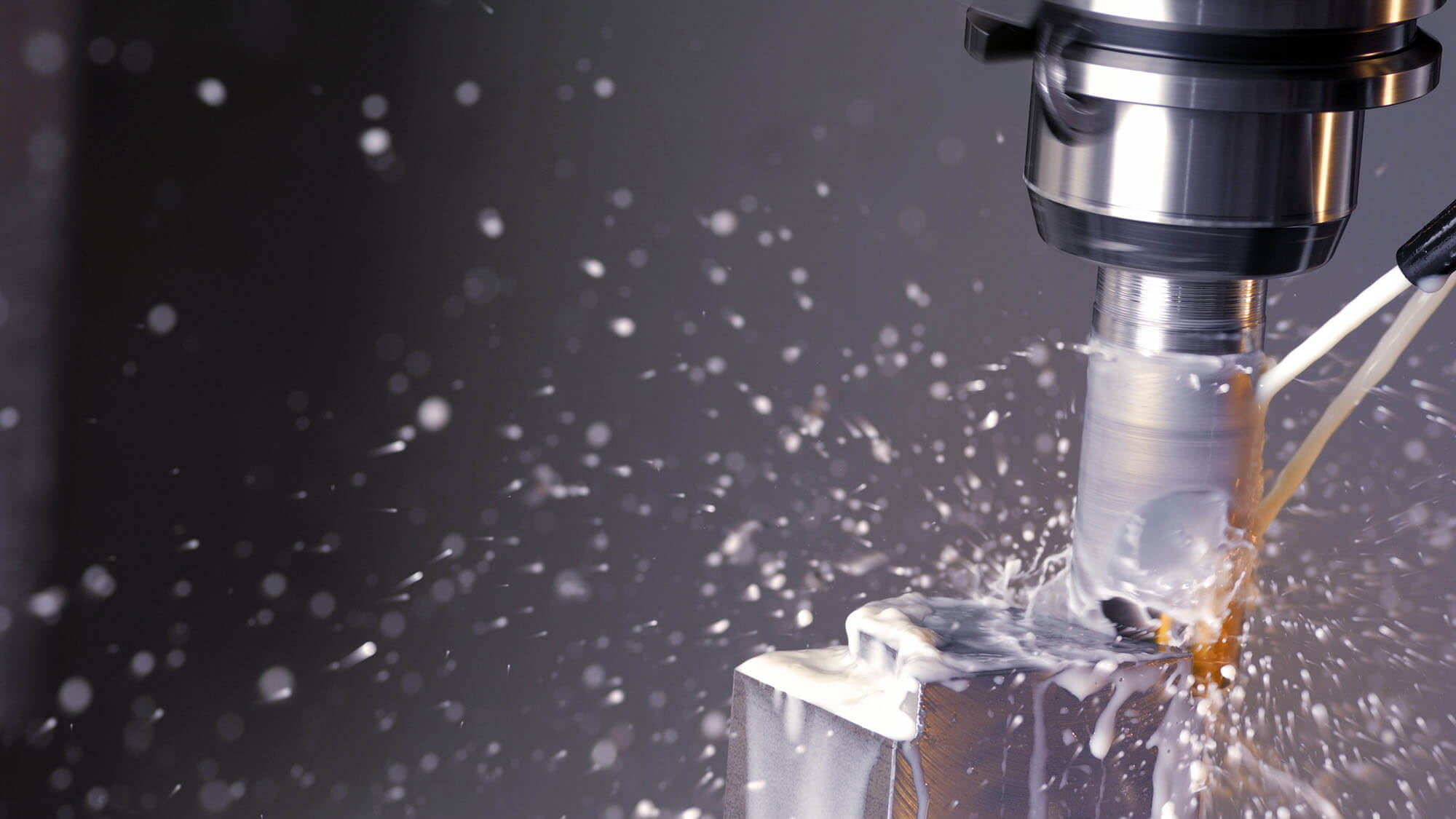 Milling machine in operation machining aluminium