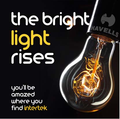 An old style incandescent filament light bulb with the 'Havells' brand name